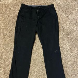 Black Old Navy pants with stain shown in photos
